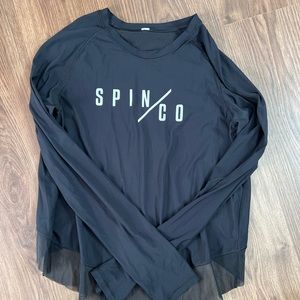 Nice warm up or cooldown top. Thumb holes and mesh cross back